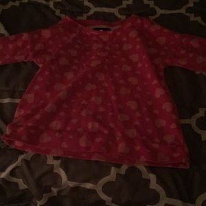A pink long sleeve shirt